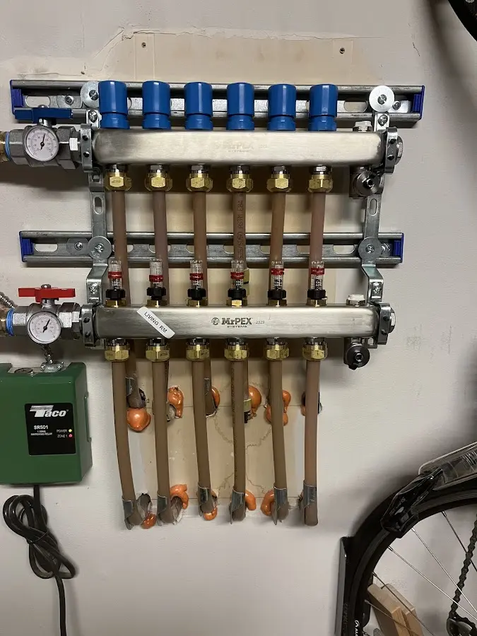 Plumber performing Water Heater Repair at a residential property in Fort Worth